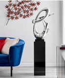 Continuium Chrome Abstract Sculpture on Black Gloss Stand