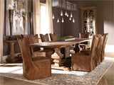 thick top grain nubuck leather slipcover chair in a distressed worn cognac with a tailored double stitched design and casual flange edges