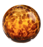 Glass round wall art colored in browns, ambers, leopard, and dark brown