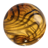 Glass round wall art colored in browns, ambers, leopard, and dark brown