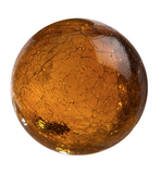 Glass round wall art colored in browns, ambers, leopard, and dark brown