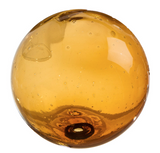 Glass round wall art colored in browns, ambers, leopard, and dark brown