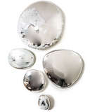 Silver Wall Decor that looks like pebbles.