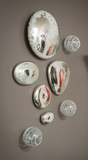 Silver Wall Decor that looks like pebbles.