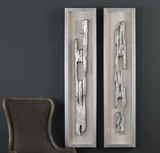 The Christly Shadow Boxes are replicated from old fence posts, finished in bright metallic silver, placed on a linen backing with a hand applied silver leaf framed shadow box. These shadow boxes come as a set of two.