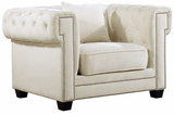 The Oak Modern Accent chair is a great choice to add to your contemporary living room. The Velvet Upholstery, deep tufts, and chrome nailhead trim works well together to provide a beautiful seating collection. Modern and stately.  Works great in modern and transitional interiors.  Several colors available.