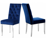 This chair has a parson's design for a sleek, contemporary look with just a hint of traditional flair. The stainless steel base is sturdy and strong, so it holds up well to everyday use. A robust chrome finish lends it modern elegance, while navy velvet upholstery is plush and welcoming, ensuring you stay comfortable all throughout the meal. 3 color available.  Sold and priced in S/2