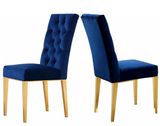 The Jamie Dining Chair S/2 Gold.  This chair has a parson's design for a sleek, contemporary look with just a hint of traditional flair. The stainless steel base is sturdy and strong, so it holds up well to everyday use. A robust gold finish lends it modern elegance, while the velvet upholstery is plush and welcoming, ensuring you stay comfortable all throughout the meal. 3 colors available.  Sold and priced in S/2