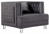 The Mauldin modern accent chair will take your home or office from ordinary to extraordinary. The nailhead trim, tufting, and acrylic legs come together to make the Mauldin collection a must have. This collection comes in four colors to better suit your design taste.