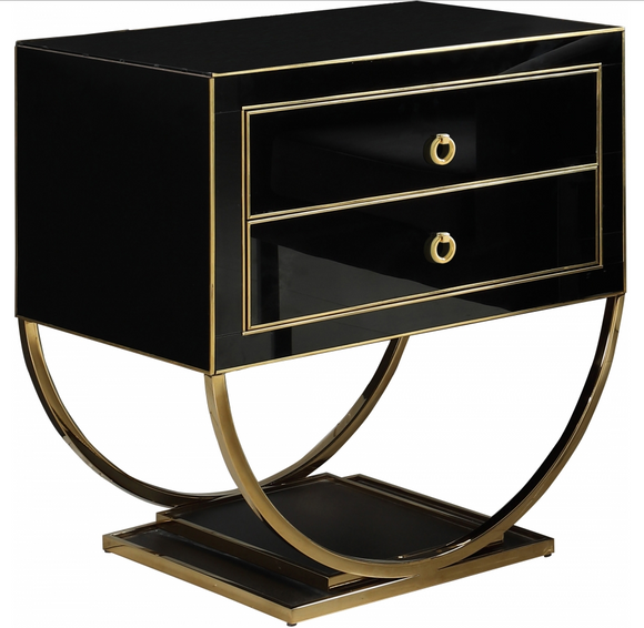 Alya Accent Cabinet is truly timeless. This handsome table features a semi-circle base on a dual pedestal for an attention-commanding look. The black or white glass finish is trimmed in gold or sliver for a contrast that's nothing short of stunning. The double drawers help you organize everything from TV remotes to games and DVDs. They would even work great as night stands. 