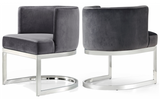 The Surround Dining Chair is retro and modern. The back of the chair has a barrel design that cradles you in comfort while you enjoy a meal with friends, and the chair is thickly padded and upholstered in plush grey velvet for a luxe feel. The base is made from stainless steel with a chrome finish or Gold for a finish that's stunningly beautiful.