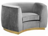 The Shell Accent Chair comes upholstered in rich, sumptuous-to-the-touch velvet in a unique offering of color to make a fashionable statement in your space. The unexpected color creates a cheery feel and stands out amid other neutral colors in your existing decor. The curved back design lends it a modish touch, and the gold stainless steel trim around its base adds to its glitzy appeal. Or the sleek stainless steel base if you prefer.