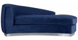 The Shell Curved Chaise Lounge comes upholstered in rich, sumptuous-to-the-touch velvet to make a fashionable statement in your space.The curved back design lends it a modish touch, and the chrome stainless steel trim around its base adds to its glitzy appeal. Great in a bedroom or lounger are or even use 2 across form each other for a "Yin Yang" Feel
