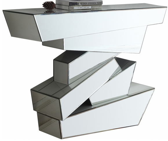 Elevate your interior with this Jagged mirrored console table. This handsome table features a staggered geometric base that makes it look more like an intricate sculpture than the actual piece of furniture it is. Every surface of the base is mirrored, so it reflects light and adds spacious appeal and dimension to your space. The top is made from thick glass and amply sized to hold collectibles or photos.