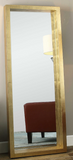 The Treton Wall or Floor Mirror is perfect to use as a dressing mirror or just for accent. This stately mirror features a deep, solid wood frame with a lightly antiqued gold leaf finish. Mirror has a generous 1 1/4" bevel. May be hung horizontal or vertical.