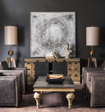 The Nest Modern Wall art is oversized and makes a statement. Adorn any wall with this eye-catching, hand painted abstract on canvas. Rich, metallic leaf accents are balanced by a refined, soft gray and white palette. The canvas, with dimensional accents, is stretched over wooden stretchers and encased in a wooden frame with a champagne silver finish. Due to the handcrafted nature of this artwork, each piece may have subtle differences. This piece may be hung horizontal or vertical.
