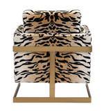 The Chitara Accent chair is bold and stylish. Featuring a chic tiger print fabric, this fashionable lounge chair boasts lived-in comfort with loose down wrapped box cushions in a plush chenille, suspended in an iron wrap-around frame finished in brushed brass. Seat height is 19".