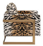 The Chitara Accent chair is bold and stylish. Featuring a chic tiger print fabric, this fashionable lounge chair boasts lived-in comfort with loose down wrapped box cushions in a plush chenille, suspended in an iron wrap-around frame finished in brushed brass. Seat height is 19".