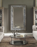 The Reveal antique floor mirror boast style. This stately mirror features a distressed, aged black, solid pine inner and outer frame surrounding heavily antiqued style side mirrors. Center mirror has a generous 1 1/4" bevel. May be hung horizontal or vertical.