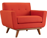 Gently sloping curves and large dual cushions create a favorite lounging spot. Whether plopping down after a long day at work, settling in with coffee and brunch, or entering a spirited discussion with friends, the Ronald accent chair is a welcome presence in your home.
