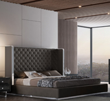 The Brexton Bed has a modern appeal. The tufted faux leather headboard is eye catching. An added bonus is the stainless steel trim that is located on the headboard, footboard, and sideboards. The curved edges are modern and graceful and boast a modern flair. Designed by furniture designer Stanley Jay Friedman.
