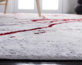 Crimson Strands Area Rug