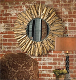 The decorative hand forged and hand hammered metal frame has an antiqued gold leaf finish with burnished edges and a light gray wash. Mirror has a generous 1 1/4" bevel.