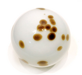 Brown and White Spotted Glass Sphere Wall Art