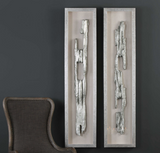 The Christly Shadow Boxes are replicated from old fence posts, finished in bright metallic silver, placed on a linen backing with a hand applied silver leaf framed shadow box. These shadow boxes come as a set of two. 