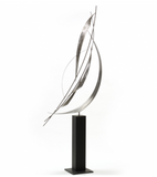 a painted steel statue with a stainless steel base