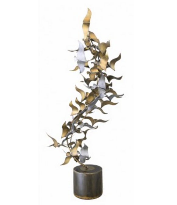 a freestanding sculpture made of wax rubbed steel
