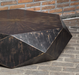 geometric table features a low profile, perfect for viewing the sunburst top in mango veneer with a worn black finish