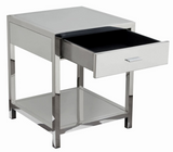 The Reflection Accent Table is sleek and stylish.  The polished chrome finish is stunning and modern.  Perfect in a guest room or the living room this accent table is sure to wow your guest.  Storage drawer is velvet lined. 