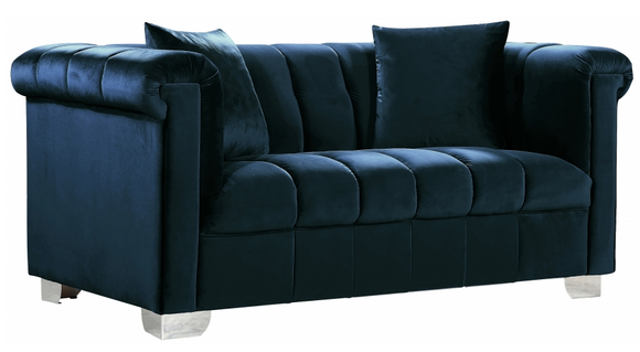 The Kristof Modern Sofa Collection has a velvet upholstery and chrome legs that will look great in your living room. The Channel upholstery is sleek and modern. This collection comes in four colors to better suit your design taste. 