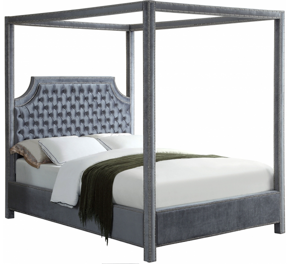 The Tailored Canopy Bed features a velvet-clad canopy that beckons you to rest like royalty. The deeply detailed tufting on the scalloped headboard makes for a sumptuous presentation, and the chrome nail heads add to the luxe look of this exquisite bed.