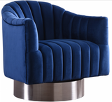 The Channel Modern Swivel Chair invites you to Relax and unwind. A beautifully modern design with hints of retro flair epitomize this lovely chair, which rests on a stainless steel base that's finished in chrome for a sleek, modern touch. The velvet upholstery gives the chair a sumptuous look, while beveled tufting lends it a plush, welcoming feel and keeps the foam inside aloft. For added fun, the chair swivels from side to side.