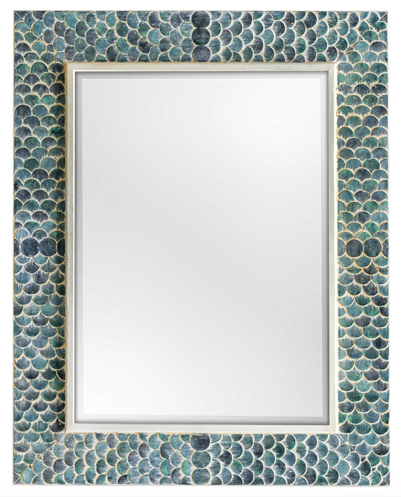 The scales wall Mirror is vibrant and interesting. This unique design takes a whimsical approach by adorning a solid wood frame with fiber glass mermaid scales, hand painted in shades of tropical blues, accented with a heavy white wash. Mirror is beveled. May be hung horizontal or vertical.