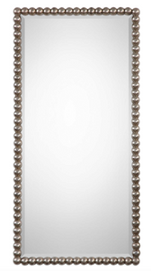 The Beaded Wall mirror is striking. The frame features a beaded profile finished in a lightly antiqued silver leaf. Mirror has a generous 1 1/4" bevel. May be hung horizontal or vertical.
