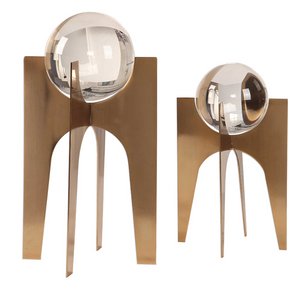 The stance decorative accessory is a must have. Crystal spheres elevated on stainless steel bases finished in a brushed, plated copper bronze.