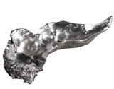 The metallic pod sculpture with attract your guest attention. This gorgeous sculpture simulates peas sitting on an open pod, finished in a tarnished, metallic silver with clear crystal spheres.