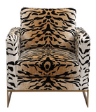 The Chitara Accent chair is bold and stylish. Featuring a chic tiger print fabric, this fashionable lounge chair boasts lived-in comfort with loose down wrapped box cushions in a plush chenille, suspended in an iron wrap-around frame finished in brushed brass. Seat height is 19".