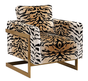 The Chitara Accent chair is bold and stylish. Featuring a chic tiger print fabric, this fashionable lounge chair boasts lived-in comfort with loose down wrapped box cushions in a plush chenille, suspended in an iron wrap-around frame finished in brushed brass. Seat height is 19".