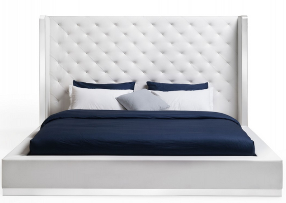 The Brexton Bed has a modern appeal. The tufted faux leather headboard is eye catching. An added bonus is the stainless steel trim that is located on the headboard, footboard, and sideboards. The curved edges are modern and graceful and boast a modern flair. Designed by furniture designer Stanley Jay Friedman.